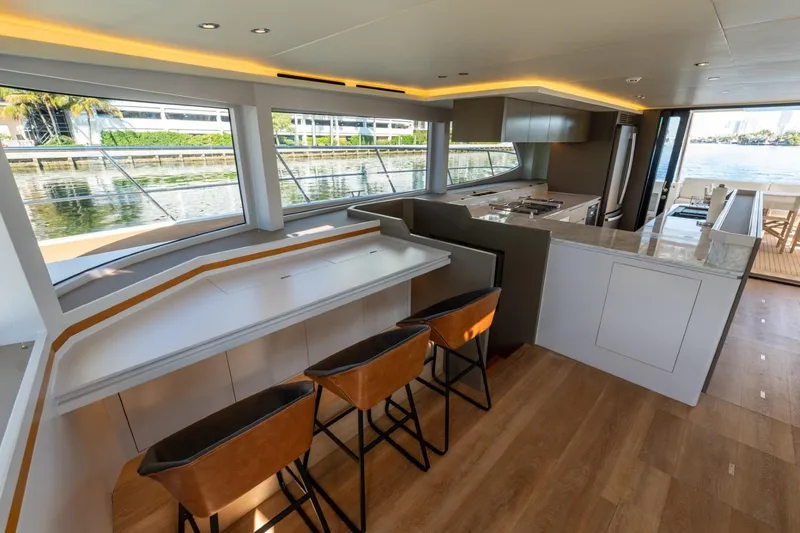 Slide: The Image of Luxurious interior of 2023 Granocean 57 yacht with modern kitchen and seating area. - 45