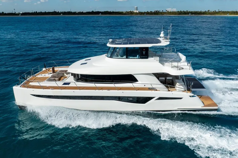 Slide: The Image of 2023 Granocean 57 yacht cruising on blue ocean waters. - 5