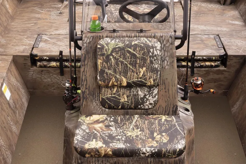 Slide: The Image of Manufacturer Provided Image: 2026 G3 Gator Tough 20 CC boat interior with camo seating and fishing rod holders. - 3