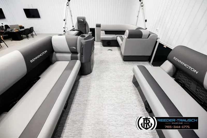 Slide: The Image of Interior of a 2026 Bennington SLJSF pontoon boat with luxurious seating. - 13