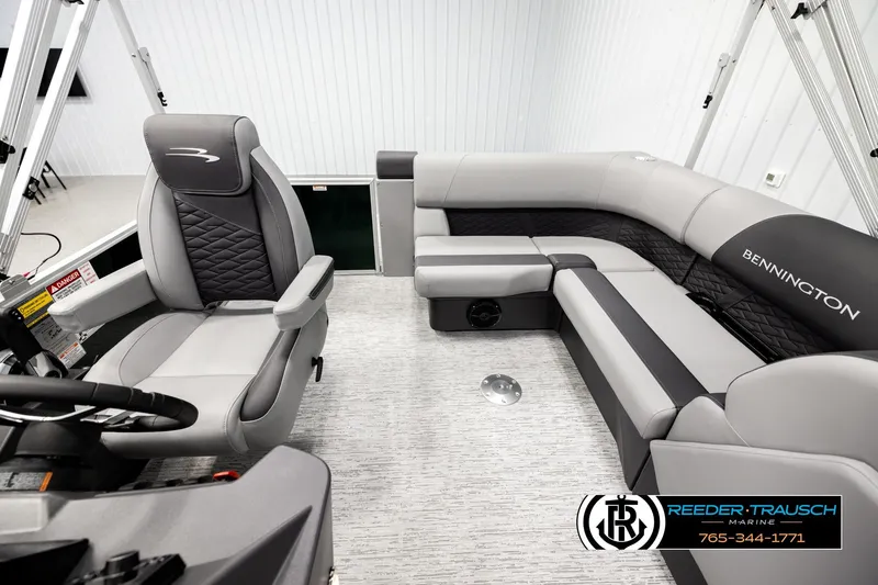 Slide: The Image of 2026 Bennington SLJSF boat interior with luxurious seating and modern design. - 14