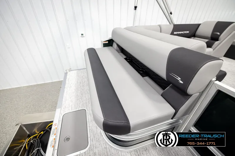 Slide: The Image of 2026 Bennington SLJSF boat interior with sleek gray seating and modern design. - 26