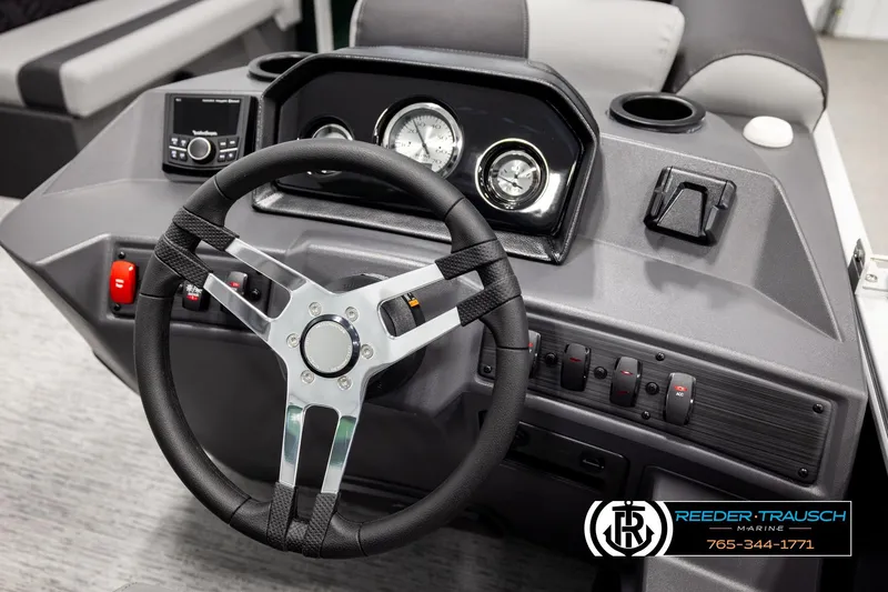 Slide: The Image of Steering console of 2026 Bennington SLJSF boat with modern controls and gauges. - 28