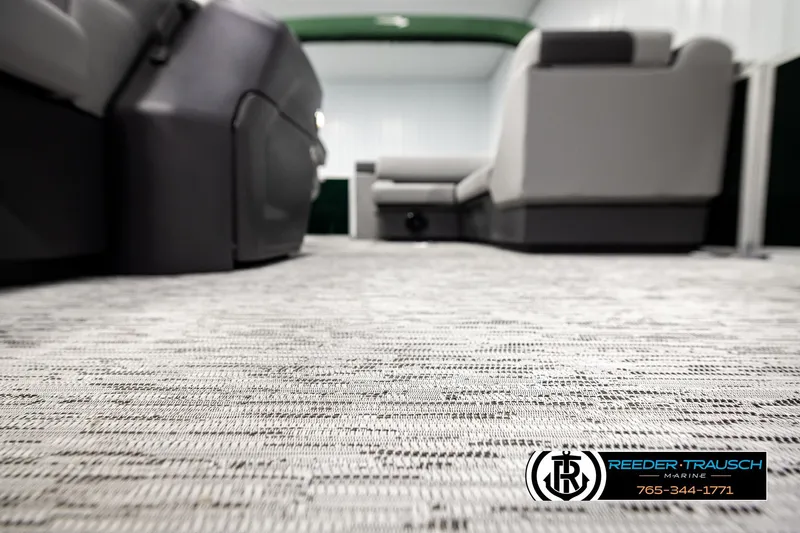 Slide: The Image of 2026 Bennington SLJSF interior with modern seating and textured flooring. - 48