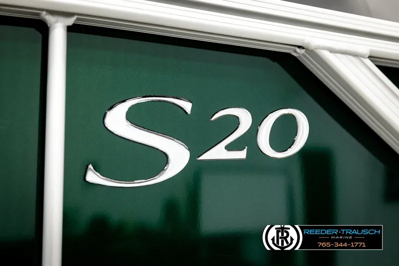 Slide: The Image of 2026 Bennington SLJSF boat with "S20" emblem, Reeder-Trausch Marine logo visible. - 50