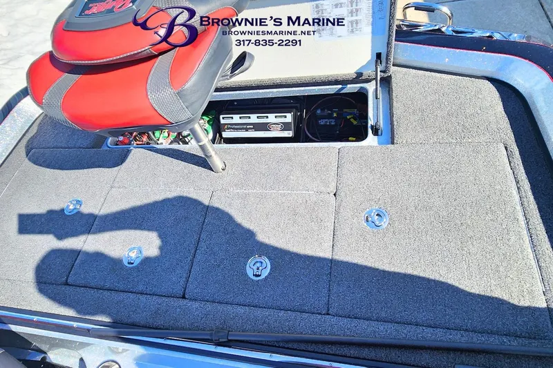 Slide: The Image of 2019 Ranger Z520L boat deck with storage compartment and red seat. - 11