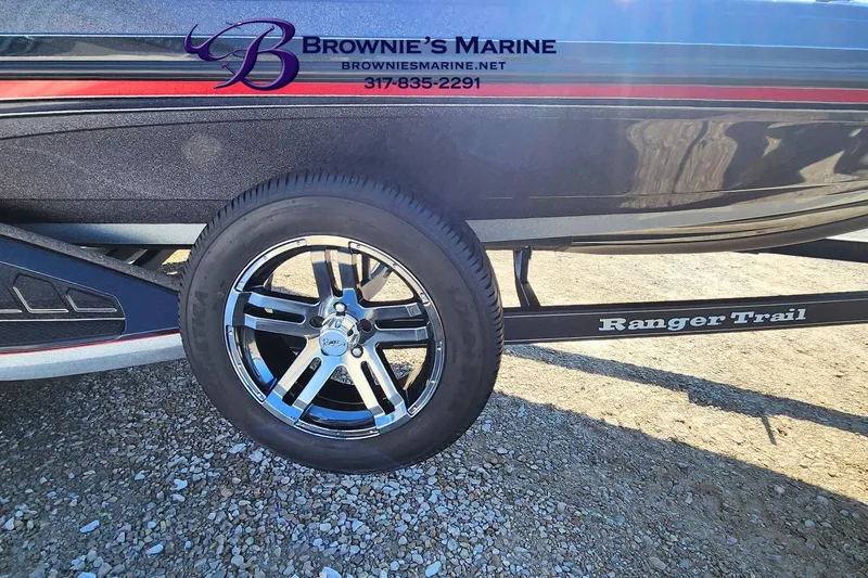 Slide: The Image of 2019 Ranger Z520L boat trailer with chrome wheel, Brownie's Marine branding. - 14