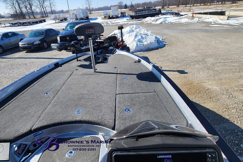 Slide: The Image of 2019 Ranger Z520L boat at Brownie's Marine dealership, parked on gravel with snow nearby. - 6