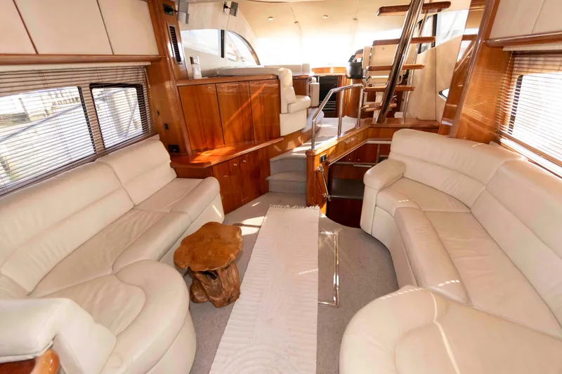 Slide: The Image of Luxurious interior of 2003 Sunseeker Manhattan 56 yacht with elegant white leather seating. - 10
