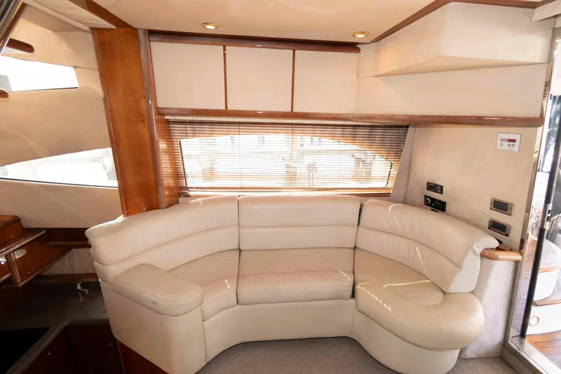 Slide: The Image of Luxurious interior of 2003 Sunseeker Manhattan 56 yacht with cream leather seating. - 12