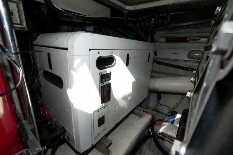 Slide: The Image of Engine room of 2003 Sunseeker Manhattan 56 yacht, featuring machinery and equipment. - 30