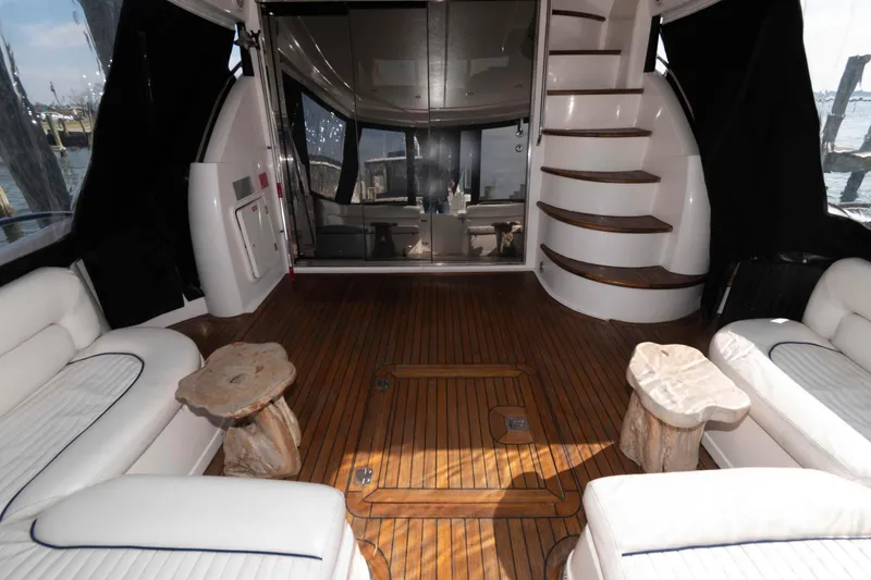 Slide: The Image of Luxurious interior of 2003 Sunseeker Manhattan 56 yacht with wooden flooring and elegant seating. - 4