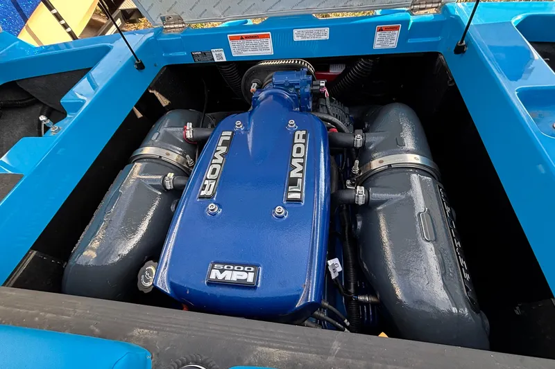 Slide: The Image of 2017 MasterCraft NXT20 Ilmor 5000 MPI engine in blue compartment. - 4