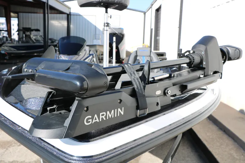 Slide: The Image of 2027 Caymas 201 Pro boat featuring a Garmin trolling motor. - 15