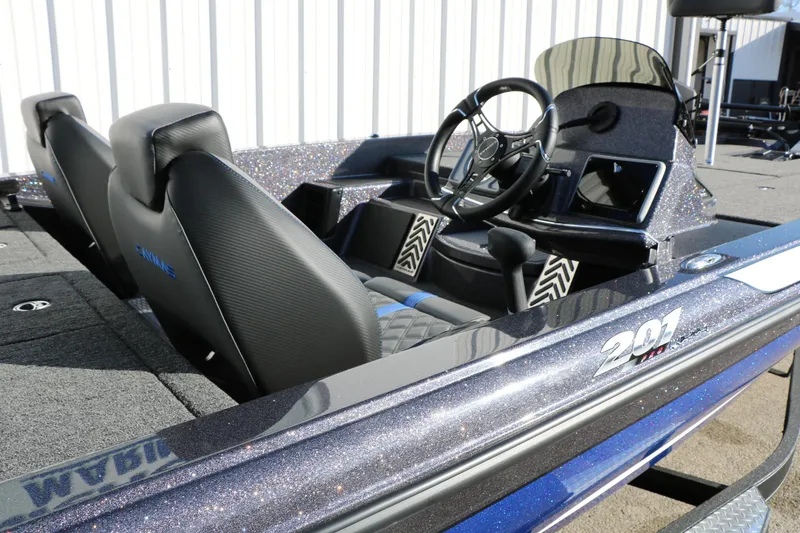 Slide: The Image of 2027 Caymas 201 Pro boat interior with sleek seats and modern dashboard design. - 16