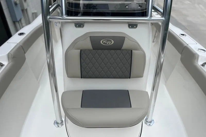 Slide: The Image of 2026 Key West 189 FS boat seat with gray and beige cushioned design. - 18