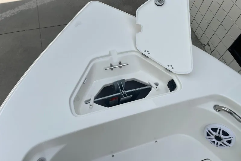 Slide: The Image of Bow storage compartment of 2026 Key West 189 FS boat with anchor. - 21