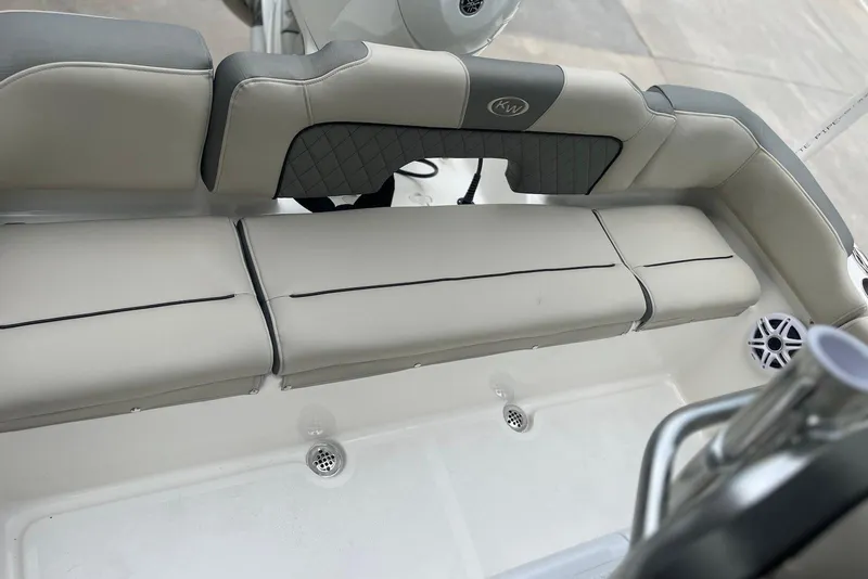 Slide: The Image of 2026 Key West 189 FS boat interior with cushioned seating and modern design. - 4