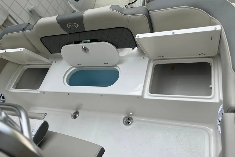 Slide: The Image of 2026 Key West 189 FS boat interior with storage compartments and seating. - 5