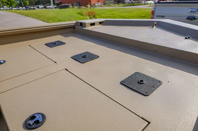 Slide: The Image of 2026 Excel Switchblade boat deck with storage compartments and mounting plates. - 5