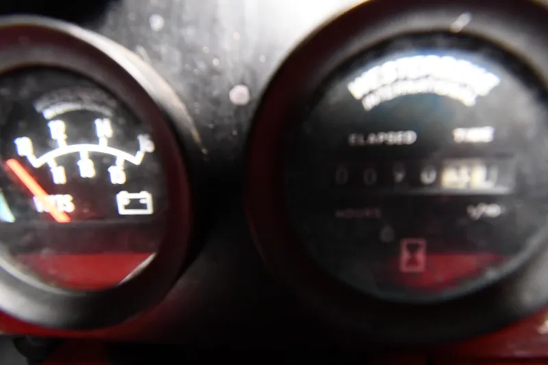 Slide: The Image of Close-up of 1995 Sea Ray 440 Sundancer boat gauges, displaying RPM and elapsed time. - 50