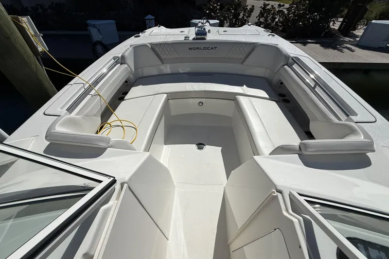 Slide: The Image of 2024 World Cat 296 DC boat interior with spacious seating and sleek design. - 12