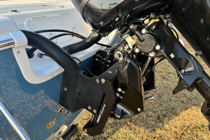 Slide: The Image of Close-up of 2026 Sea Pro 250 Bay boat engine and transom details. - 3