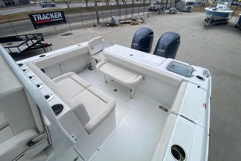 Slide: The Image of 2021 Sea Hunt Gamefish 27 boat with forward seating and dual engines. - 26