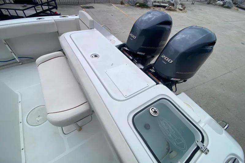 Slide: The Image of 2021 Sea Hunt Gamefish 27 boat with dual Yamaha 200 engines, forward seating view. - 29