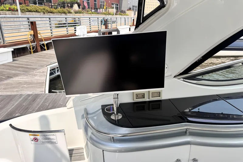 Slide: The Image of Luxury yacht interior with mounted TV, Formula 400 FX8, 2014 model, docked at marina. - 10