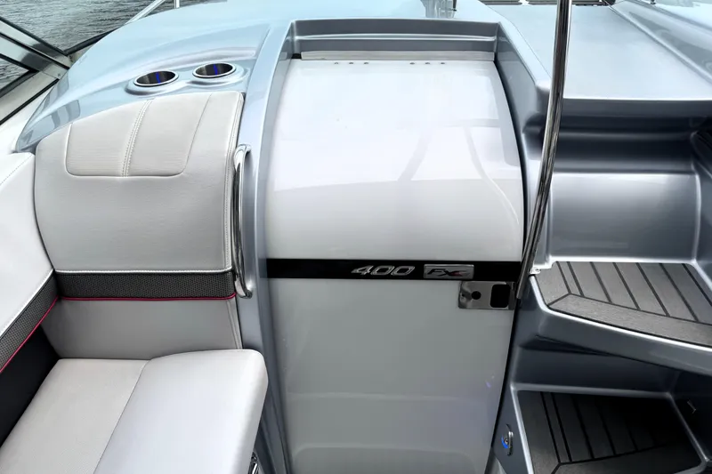 Slide: The Image of 2014 Formula 400 FX8 boat interior with sleek seating and modern design. - 16