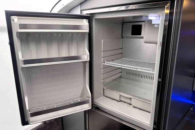 Slide: The Image of Open stainless steel refrigerator, Formula 400 FX8, 2014 model, with empty shelves and door compartments. - 22
