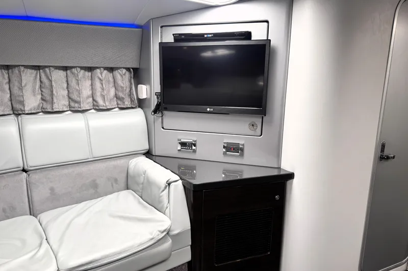 Slide: The Image of Luxurious interior of 2014 Formula 400 FX8 with TV and plush seating. - 28