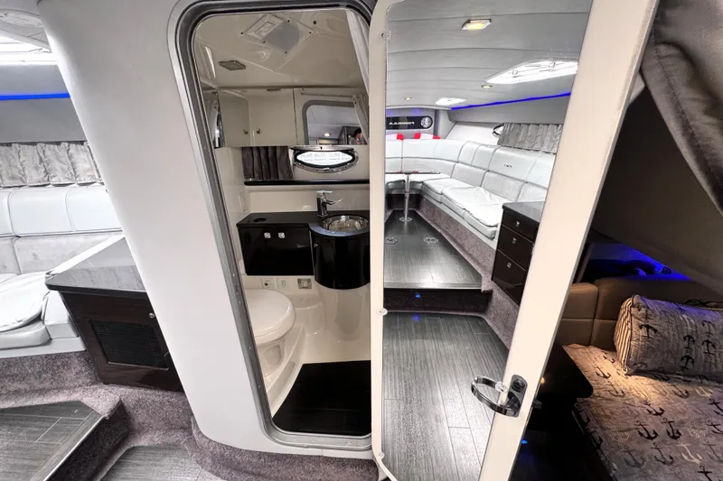 Slide: The Image of Luxurious interior of 2014 Formula 400 FX8 boat with modern amenities and seating. - 30