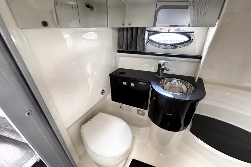 Slide: The Image of Luxurious bathroom in 2014 Formula 400 FX8 boat with modern fixtures and sleek design. - 31