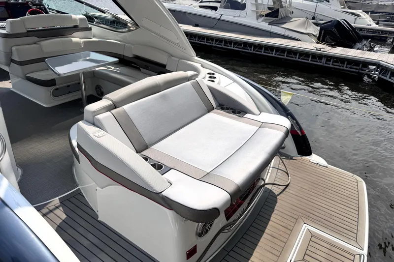 Slide: The Image of Luxury 2014 Formula 400 FX8 yacht interior with seating and table, docked at marina. - 36