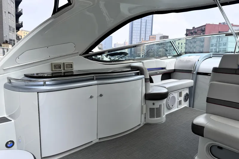 Slide: The Image of 2014 Formula 400 FX8 yacht interior with sleek seating and modern amenities. - 47