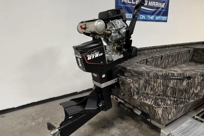 Slide: The Image of 2026 Havoc 1756 MRST boat with powerful Gator-Tail motor, camo design, in showroom. - 5