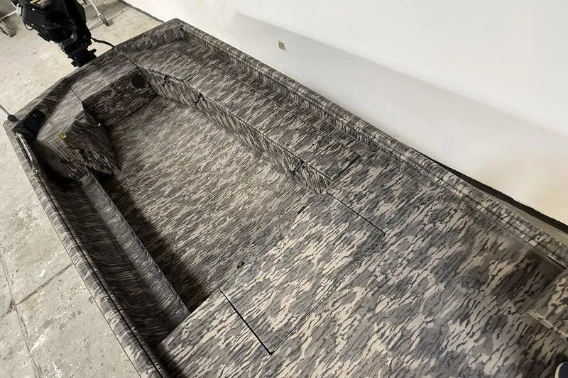 Slide: The Image of 2026 Havoc 1756 MRST boat with camouflage interior design. - 7