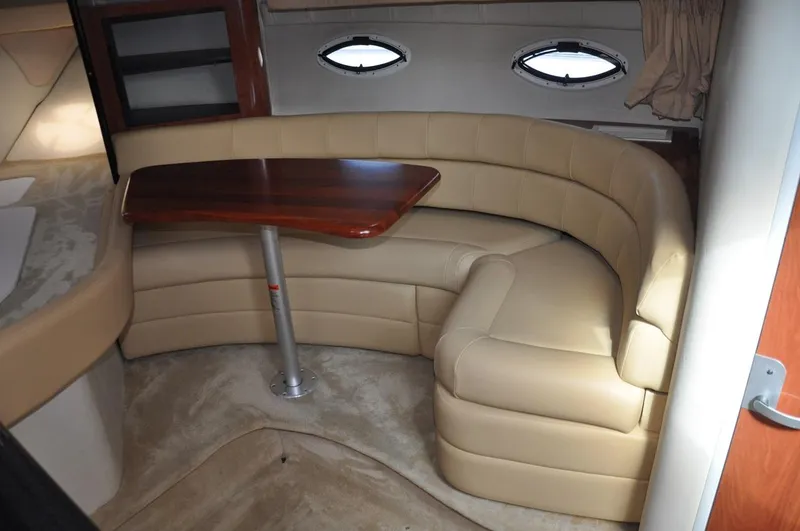 Slide: The Image of Luxurious interior seating area of a 2006 Monterey 322 Cruiser yacht. - 14