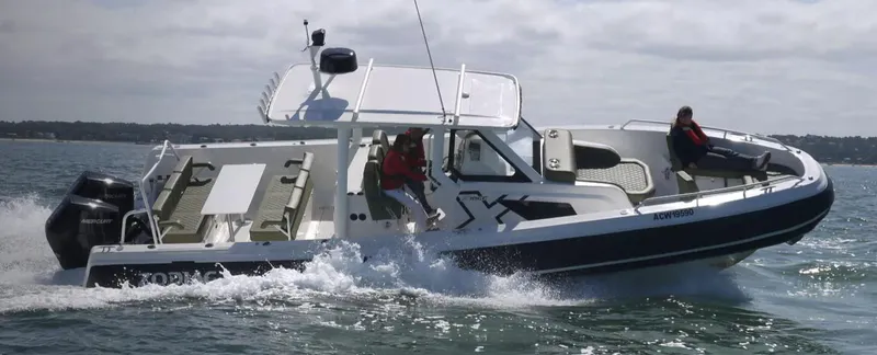 The Image of 2025 Zodiac X10CC boat cruising on open water. - 1