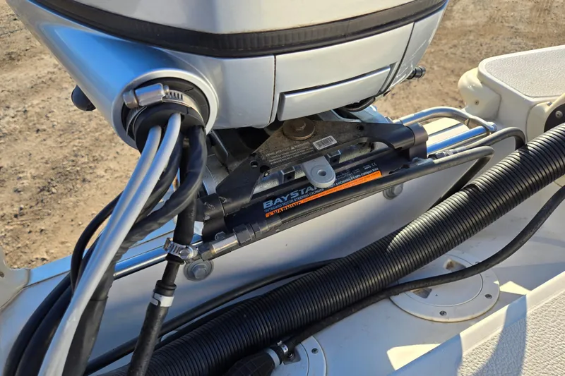 Slide: The Image of 2019 Starcraft MDX 211 O/B boat steering mechanism with cables and hydraulic system. - 12