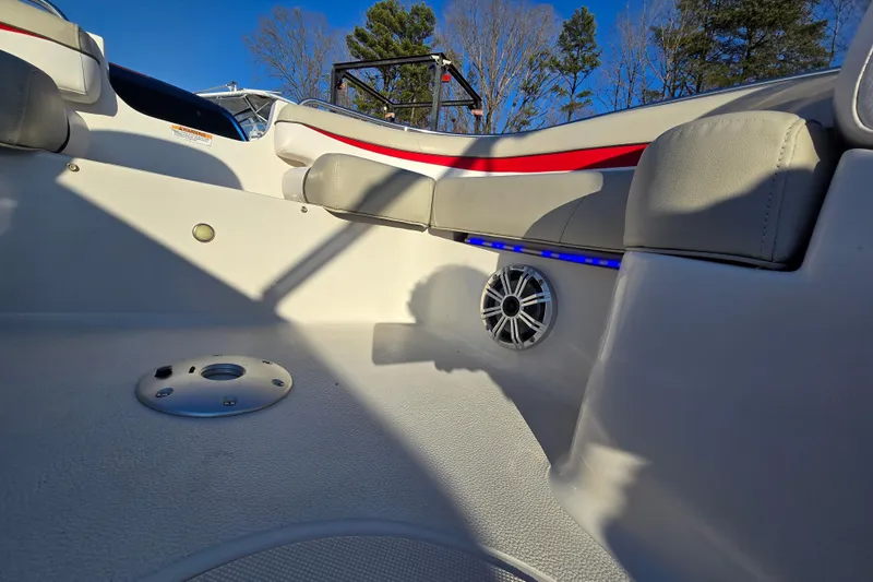 Slide: The Image of 2019 Starcraft MDX 211 O/B boat interior with seating and speaker system. - 36