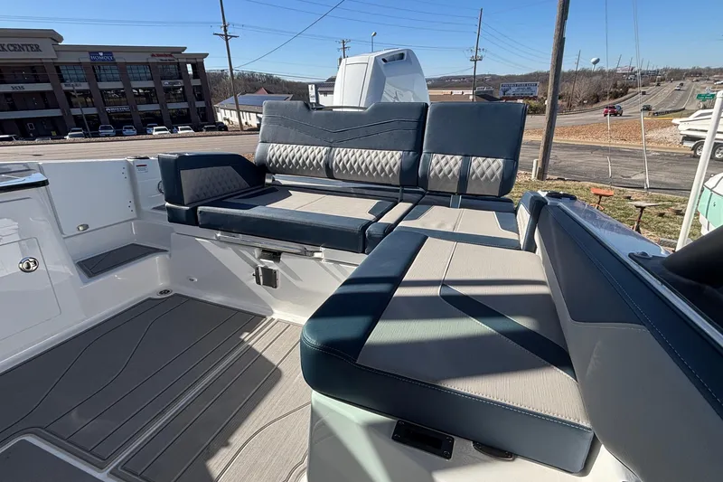 Slide: The Image of 2026 Monterey Elite 27 OB boat interior with stylish seating and modern design. - 21