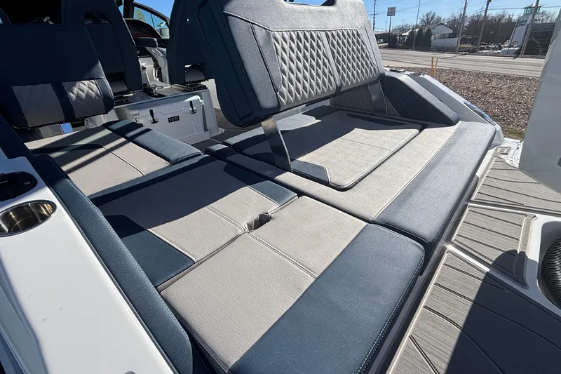 Slide: The Image of 2026 Monterey Elite 27 OB boat interior with luxurious seating and modern design. - 4