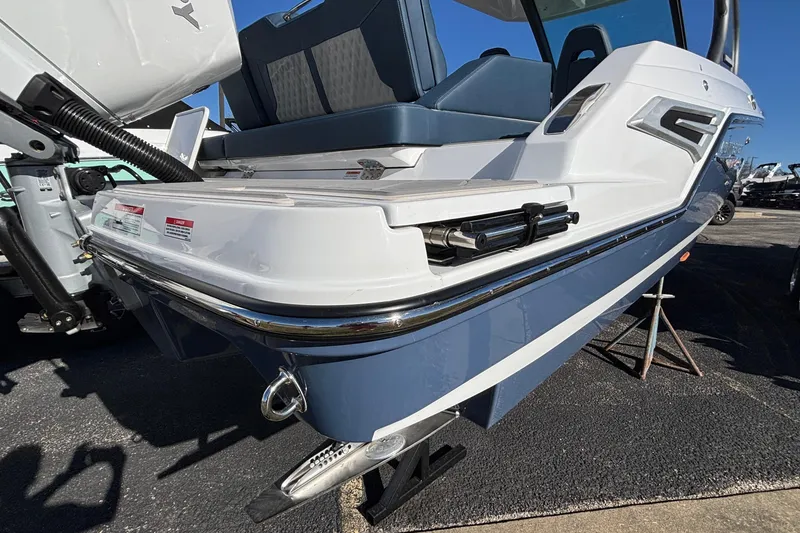 Slide: The Image of 2026 Monterey Elite 27 OB boat rear view, showcasing sleek design and modern features. - 67