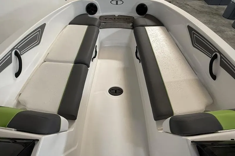 Slide: The Image of 2024 Tahoe T21 boat interior with cushioned seating and modern design. - 15
