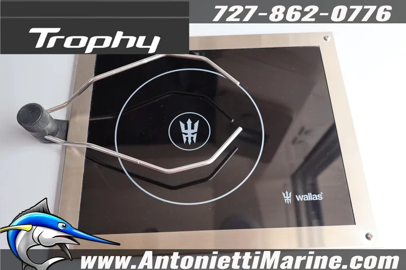 Slide: The Image of Bayliner Trophy T25 Explorer 2026 stove with Wallas logo, contact info, and website. - 14