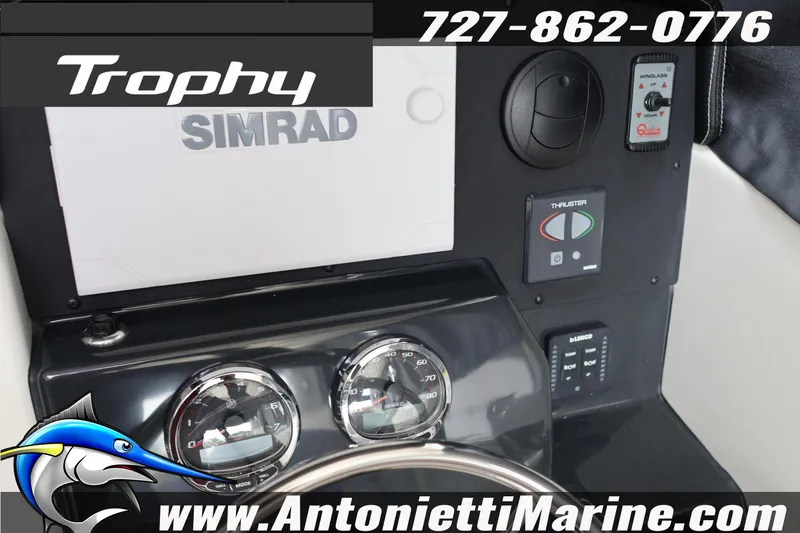 Slide: The Image of Dashboard of 2026 Bayliner Trophy T25 Explorer with Simrad electronics and controls. - 24