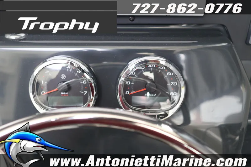 Slide: The Image of Dashboard of 2026 Bayliner Trophy T25 Explorer with RPM and speed gauges. - 25